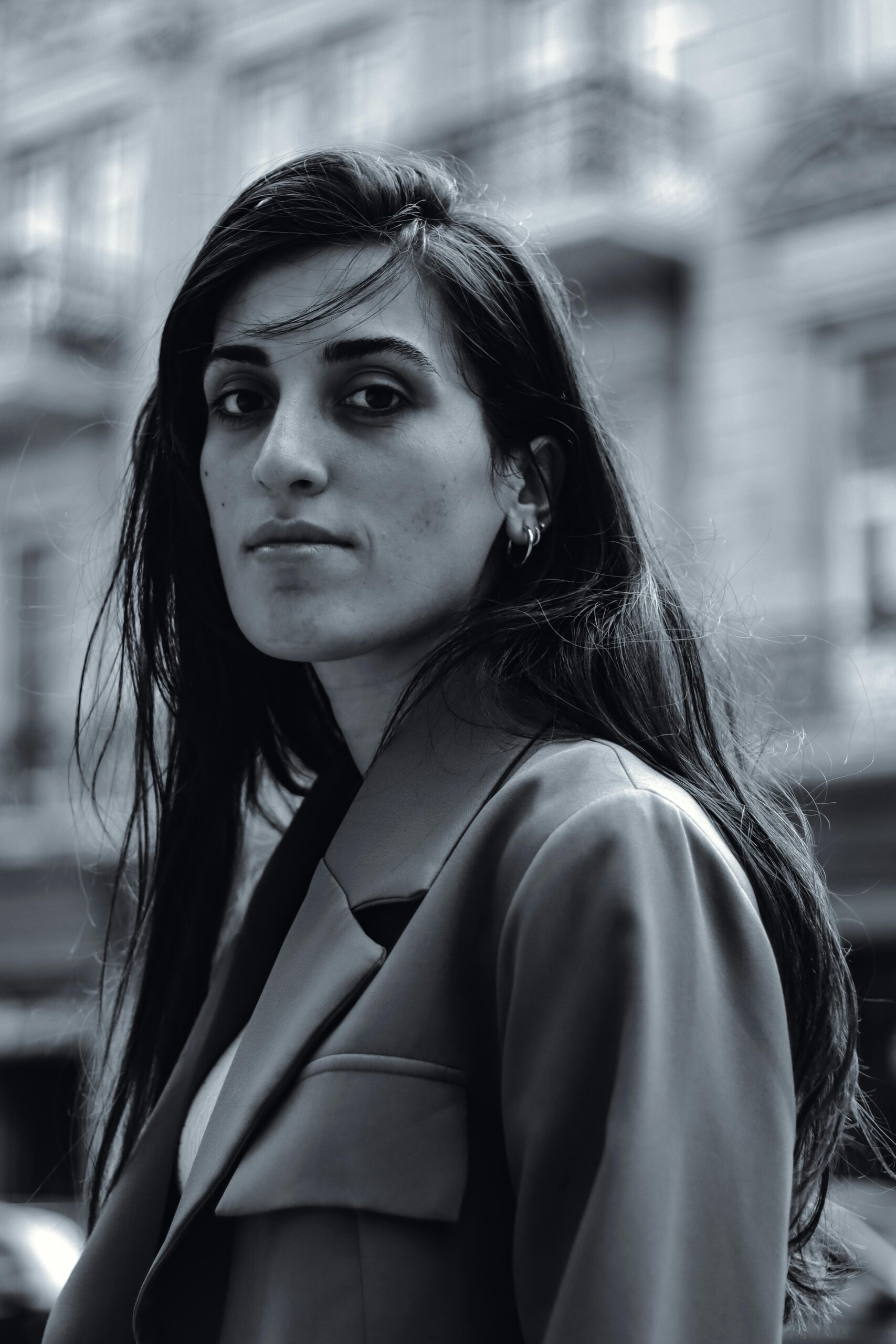 Sophisticated black and white portrait of a woman with long hair in Baku. Stylish and elegant look.